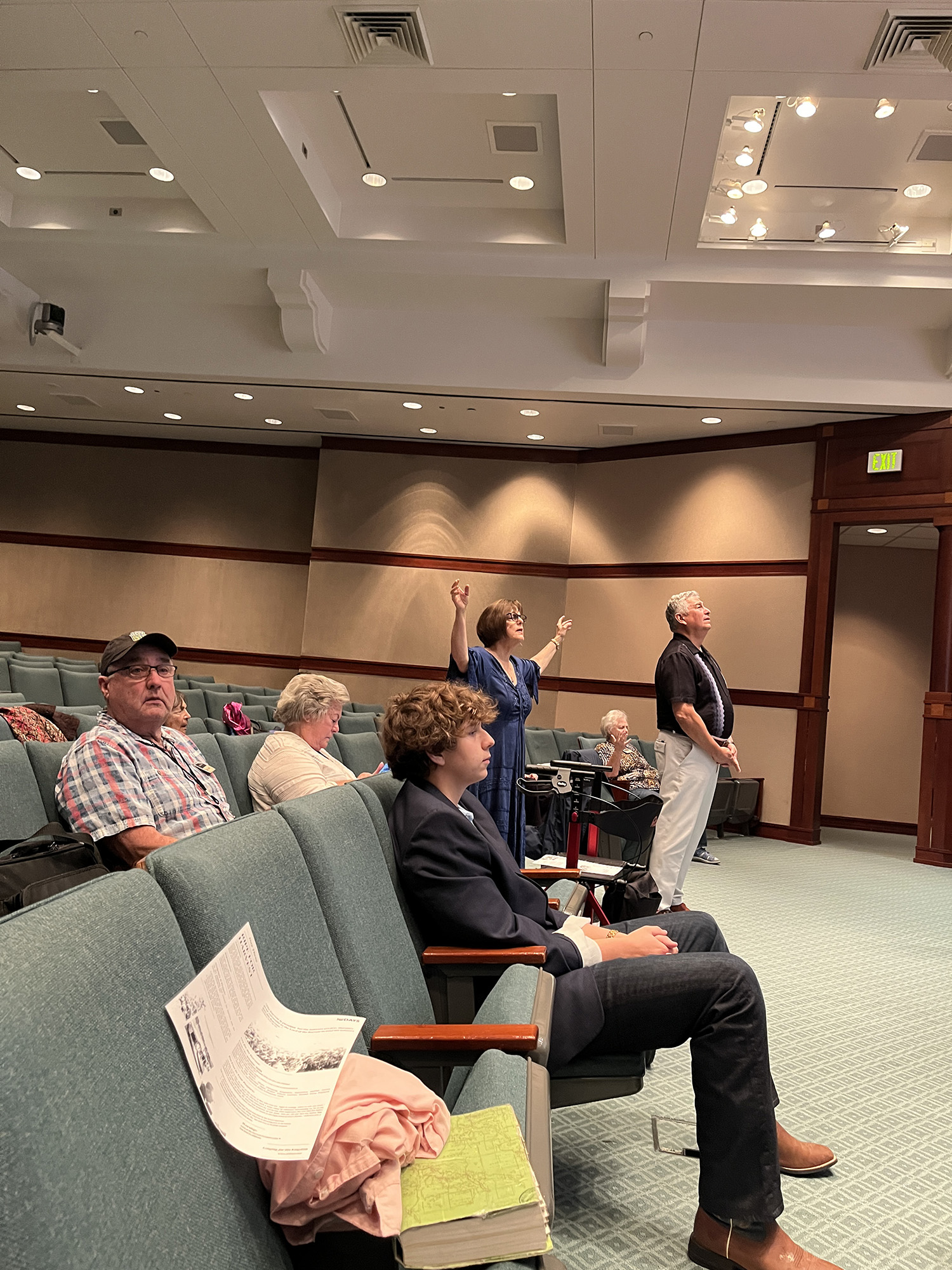 Attendees worship together