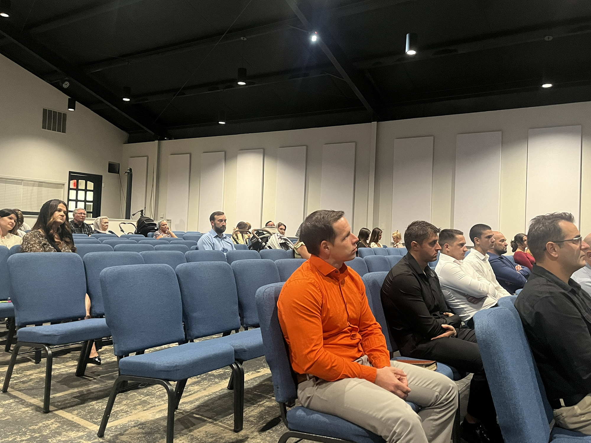 God Will Provide Church attendees listen