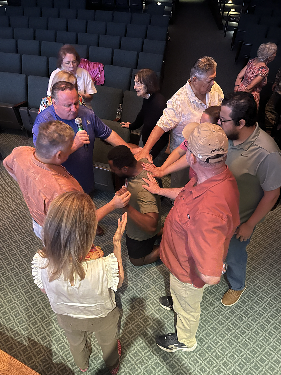 We gather to lay hands in prayer on our brother and to pray for Nigeria