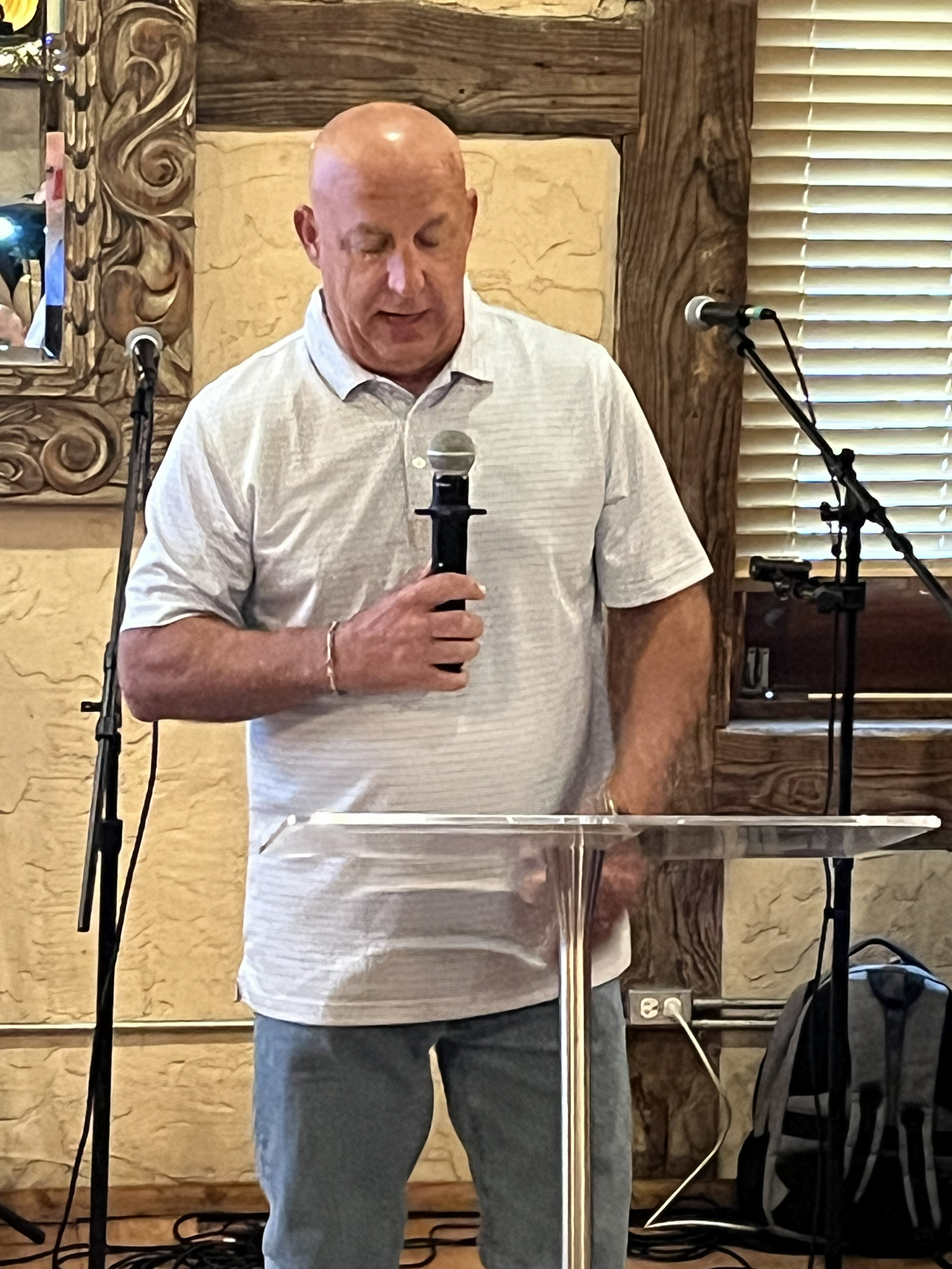 Mayor and Pastor Ritchie reads, speaks, and prays