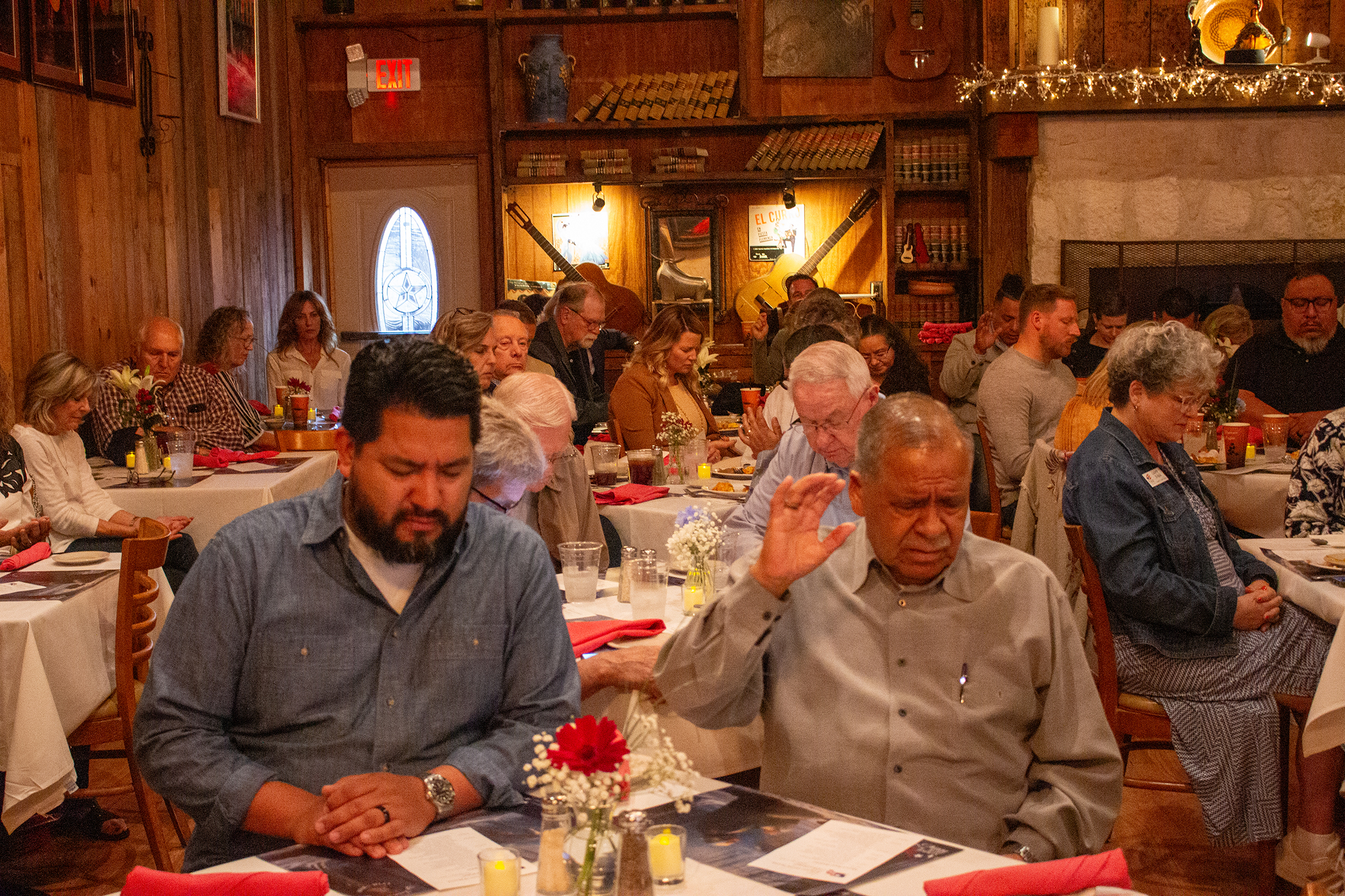 The room is united in prayer